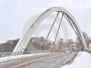 Freedom bridge over Emajogi river in the snow, Tartu