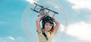 Freedom carefree and kids dream. Child dreams of future. Kid pilot aviator dreaming. Child dream concept. Blonde cute