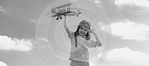 Freedom carefree and kids dream. Kid dreams of future. Kid pilot dreaming. Child dream concept. Blonde cute daydreamer photo