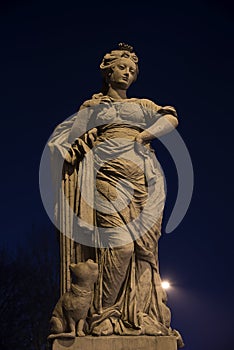 Freedom figure at night, sculpture from the 18th century on the