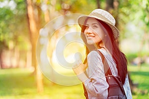 Freedom and Finding Concept: Casual cute smart Asian women walking in the park