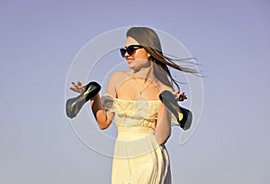 Freedom. Girl in sunglasses copy space. Model tender summer dress. Towards summer. Afterparty concept. Woman sunrise