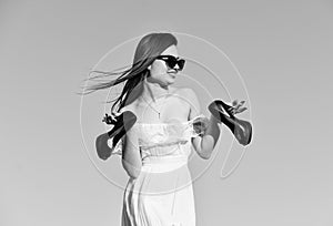 Freedom. Girl in sunglasses copy space. Model tender summer dress. Towards summer. Afterparty concept. Woman sunrise