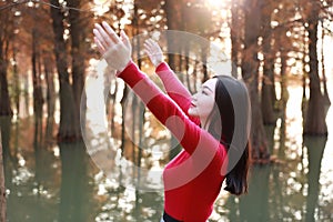 Freedom happy woman feeling free in autumn nature air