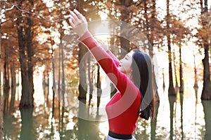 Freedom happy woman feeling free in autumn nature air