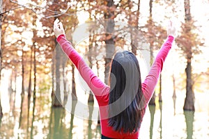 Freedom happy woman feeling free in autumn nature air