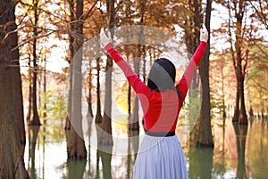 Freedom happy woman feeling free in autumn nature air