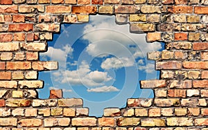 Freedom - A hole in the brick wall with cloudy sky in the background