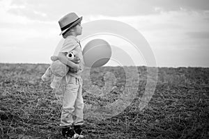 Freedom for kids. Imagination and freedom concept. Child dreams. Faith and trust. Kid having fun in spring field.
