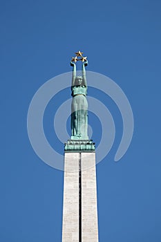 The Freedom monument with honor guard on Brivibas Boulevard in Riga