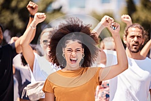 Freedom, support and protest with black woman and fist with crowd in city street for global justice and human rights