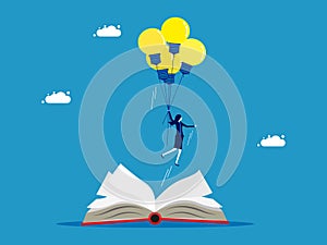 Freedom to learn and imagine. Businesswoman flying with a light bulb flying out of a book