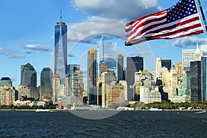 Freedom Tower New York City, American flag in front.