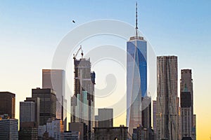 Freedom Tower with New York Skyline at Sunset