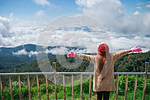 Freedom woman on mountain top