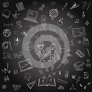 Freehand drawing school items on the board. Back
