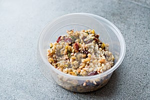 Freekeh Grain Tabule with Barberries and Peanut and Corn / Tabula in Plastic Box.