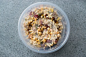 Freekeh Grain Tabule with Barberries and Peanut and Corn / Tabula in Plastic Box.