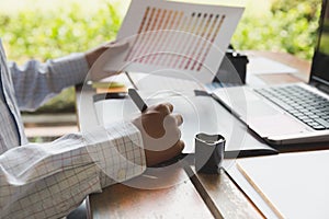 freelance graphic designer using digital tablet, computer, man w