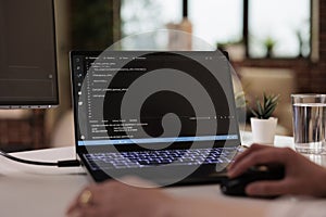 Asian web developer using terminal window