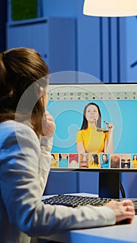 Freelancer retoucher woman working overtime on laptop computer