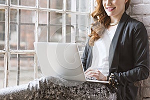Freelancer working on computer in home