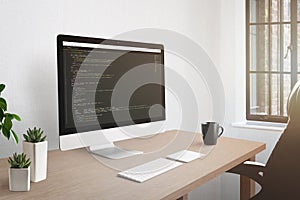 Freelancer workplace concept. Computer display with open code editor