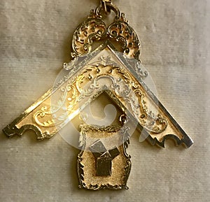 Freemasons jewel sparkles under oblique lighting