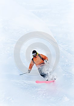 Freeride skier in powder snow photo