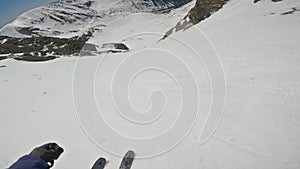 Freeride Skiing down a chute in winter Alps mountains backcountry, adrenaline adventure freedom, action head camera view