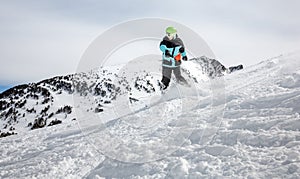 Snowboarder moving down