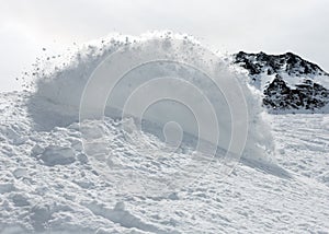 Freerider snowboarder in snow powder