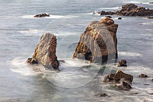 Freestanding rock formations, Garrapata Beach, California. photo