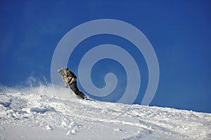 Freestyle snowboarder jump and ride