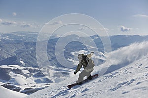 Freestyle snowboarder jump and ride
