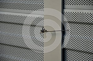 freeway bridge drainage. A sound-absorbing wall with holes lets water