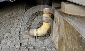 freeway bridge drainage. A sound-absorbing wall with holes lets water