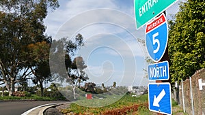 Freeway entrance, information sign on crossraod in USA. Route to Los Angeles, California. Interstate highway 5 signpost as symbol