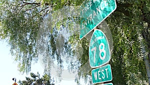 Freeway entrance sign on interchange crossraod in San Diego county, California USA. State Route highway 78 signpost plate. Symbol