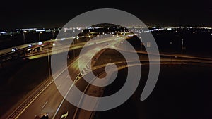 Freeway interchange at night aerial view.