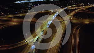 Freeway interchange at night aerial view.