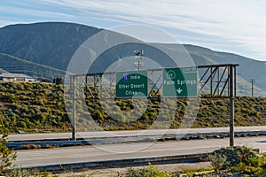 Freeway signs on Interstate 10 I-10 for Other Desert Cities, Indio, and 111 Palm Springs, California