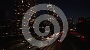 Freeway traffic in downtown Los Angeles at night. Evening Rush Hour Traffic. 4K