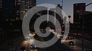 Freeway traffic in downtown Los Angeles at night. Evening Rush Hour Traffic. 4K