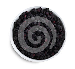 Freeze dried blueberries in bowl on white background, top view