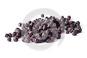 Freeze dried blueberries on a white background.