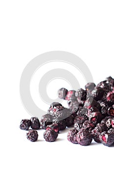 Freeze dried blueberries on a white background.