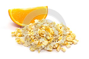 Freeze dried and fresh orange on a white background.