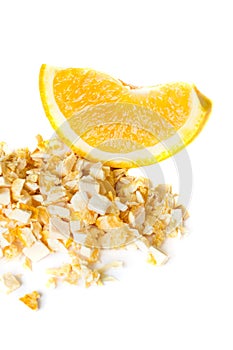 Freeze dried and fresh orange on a white background.