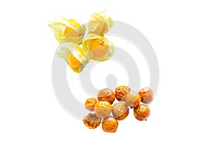 Freeze dried and fresh physalis on a white background.